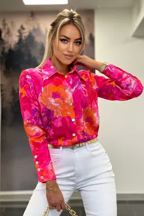 Camicia elegante arancione e fucsia a fantasia floreale con bottoni dorati